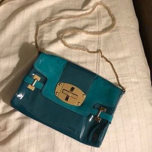 Charming Charlie teal two toned crossbody